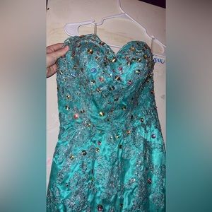 Strapless turquoise prom dress, wore maybe 5 times in pageants.